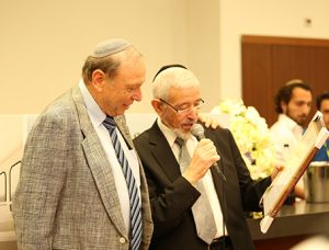 Prof Reuven Or receiving an award from zichron menachem