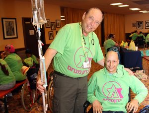 Prof Reuven Or treating a teenager with cancer